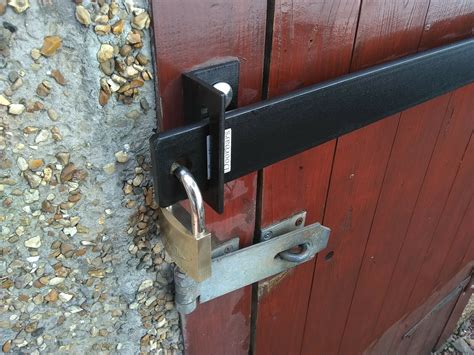 metal brackets for door security|security bars for exterior doors.